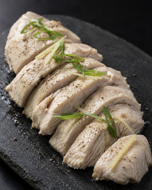 Ayam Rebus — sliced poached chicken breast with ginger and spring onion
