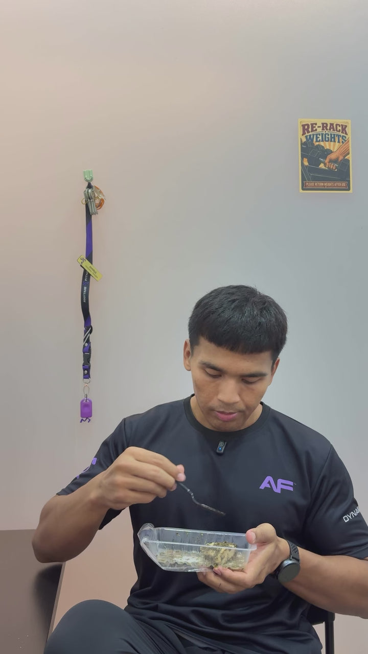 Amirul eating a HiPro roasted chicken breast